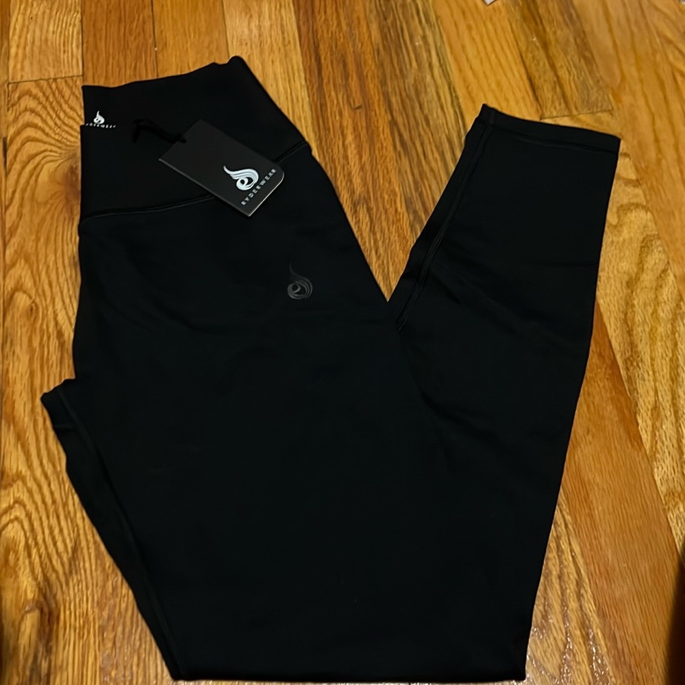 Ryderwear women’s black activewear leggings with cross waist & butt scrunch